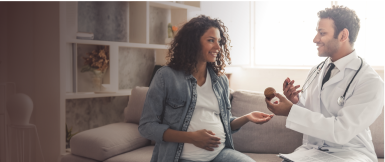 Consultant speaking with a pregnant woman