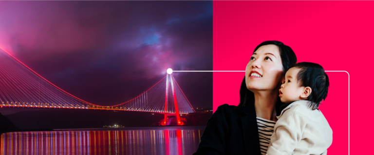 Interact image of mother and child with a bridge in the background