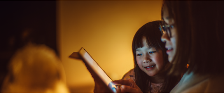 Mother and child watching tablet