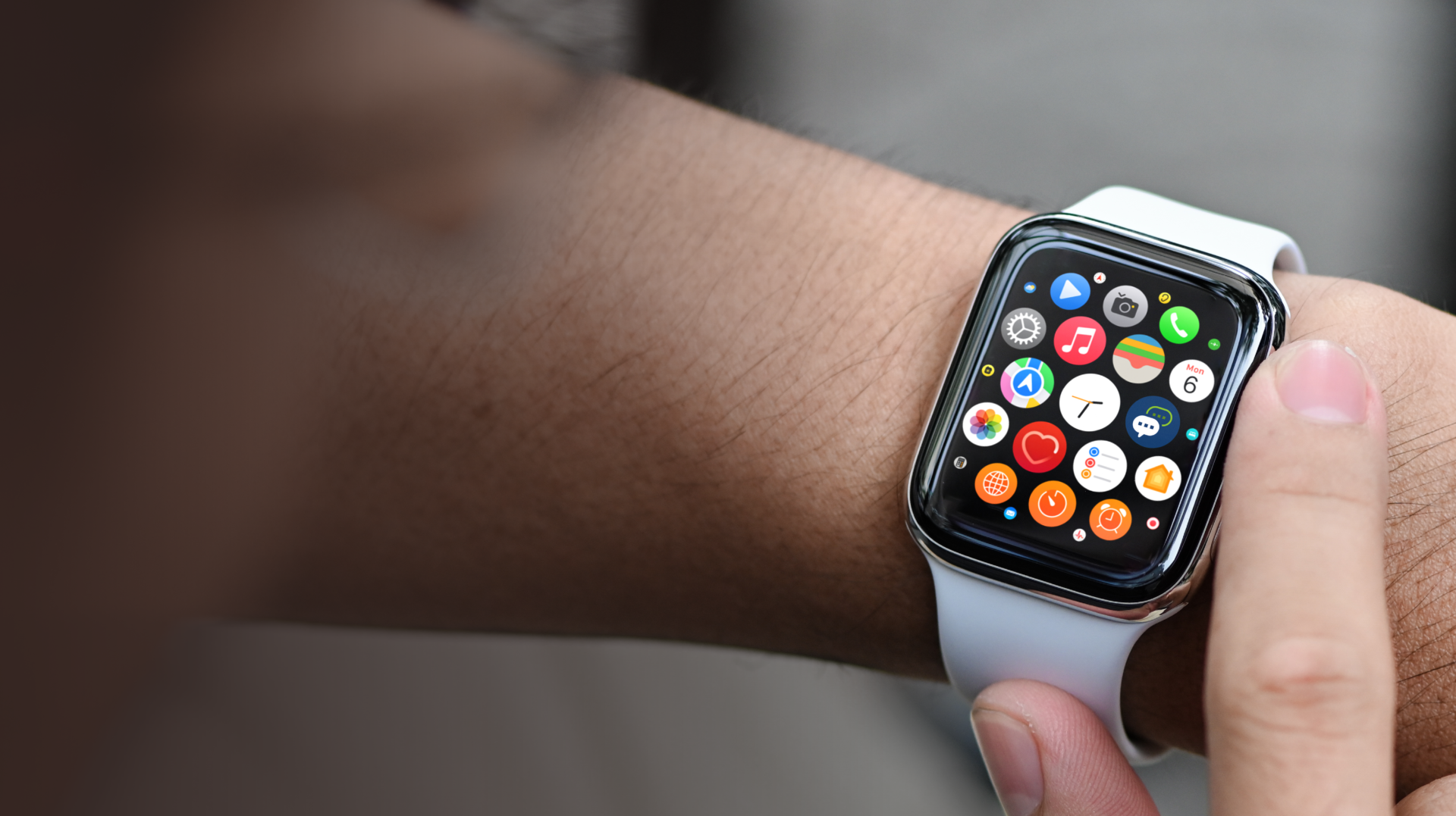 Mockup of apple watch displaying apple watch app icons
